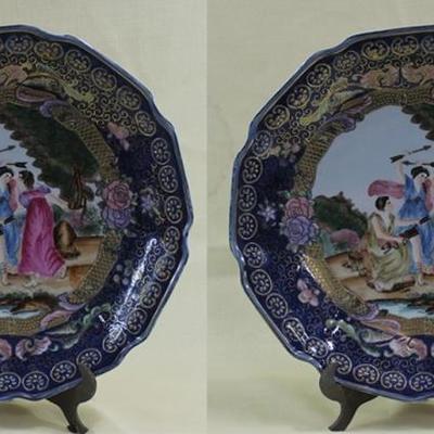 Pair of porcelain Goddess fight scene chargers,  1.5