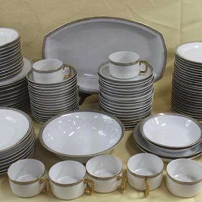 Large set porcelain dishes, 3 vegatable trays , 1  serving platter, 4 bowls various size, gravy bowl,  8 cups and saucers, 24 bread...