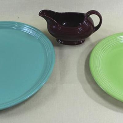 Box lot of porcelain Fiestaware with two serving  dishes lime and teal green and a maroon gravy  bowl. Largest dish is 15