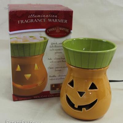 New in the box pumpkin shape candle warmer 6.5