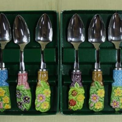 Twelve (12) porcelain condiments spoons made in  Japan. Each spoon is 6