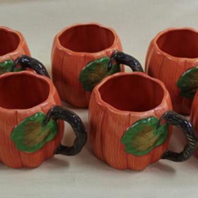 Eight pumpkin mugs 3.5