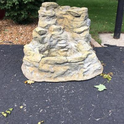 Outdoor rock fountain and new pump in box 100.00