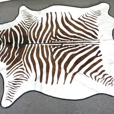Large Cowhide Exotic Zebra Skin Rug. In good condition, a perfect area rug for any Room. Measures 84