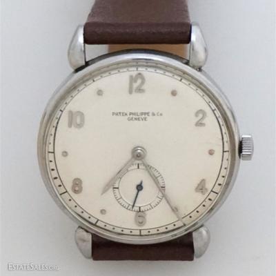 Gentleman's Patek Philippe 18 jewel Stainless Cased Watch c. 1945. Very Rare. Arabic numerals, Manual Wind. Movement 911999, Case 635472....