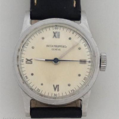 Gentleman's Patek Philippe 20J Stainless Cased Watch 1945. Very Rare. Roman numerals at XII, III, VI, and IX, Manual Wind. Movement...