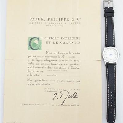 Gentleman's Patek Philippe 20J Stainless Cased Watch 1945. Very Rare. Roman numerals at XII, III, VI, and IX, Manual Wind. Movement...