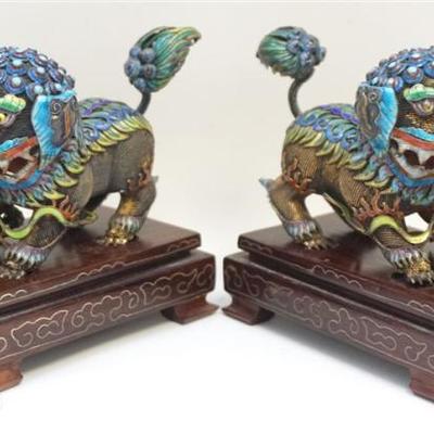 Chinese Cloisonne Foo Dogs on Rosewood Bases. These 2 highly ornamental Foo Dogs are each stamped 