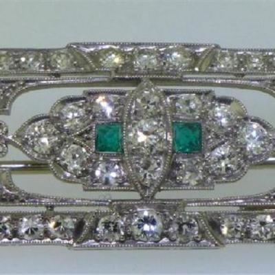 Another gorgeous piece of antique jewelry! This brooch/pendant is set in platinum and measures approx. 1.55