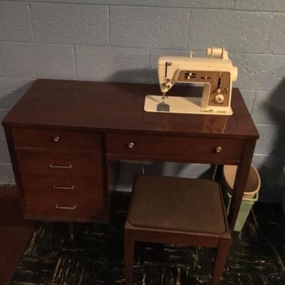 Sewing table with built in Singer sewing machine