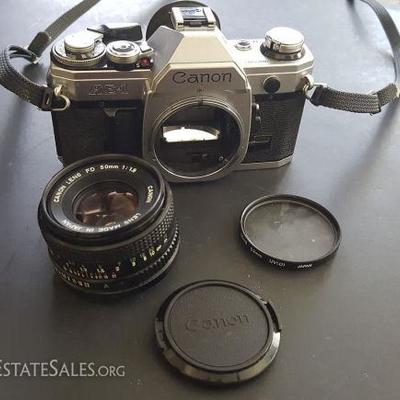WDG102 Vintage Canon AE-1 SLR Camera, Lens, Filter, Cap
