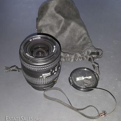 WDG103 Nikon AF Nikkor Lens, Caps, Carrying Bag
