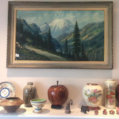  Large original oil painting by local artist of Mount Rainier and a view of the White river.  On the mantle is a selection of NW studio...