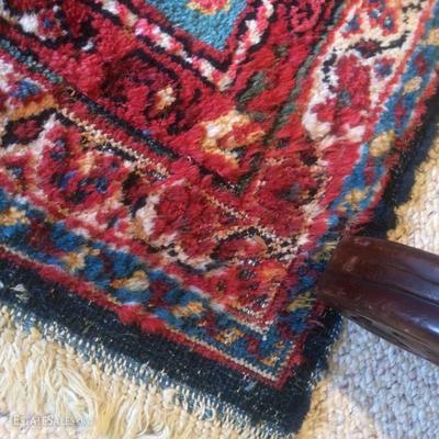 This rug does have some slight moth damage shown here. It was treated many years ago and overall looks great