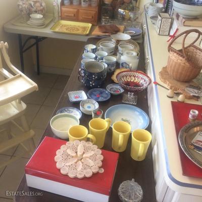 Kitchen collectibles including mugs, tins, dishes, glassware,etc.