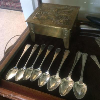 Sterling silver tea spoons and a hand hammered arts and crafts hinged brass box