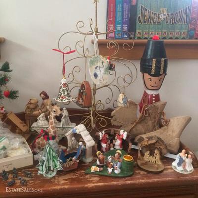 Christmas decorations including several small nativity sets