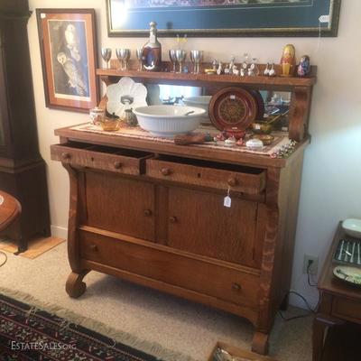 Antique oak sideboard with mirrored bib.