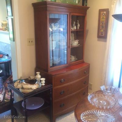 Mahogany breakfront china hutch with a working key