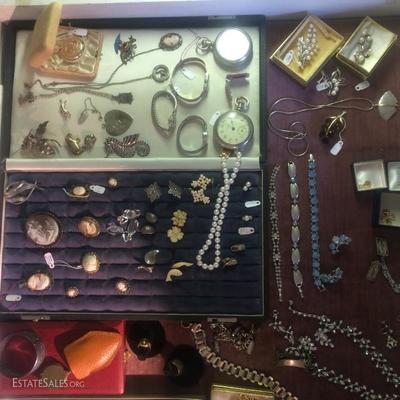 A nice collection of modern and vintage jewelry. There is a modest selection of fine jewelry and some vintage costume (