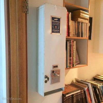 Functional sanitary napkin dispenser with original key