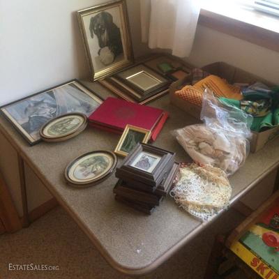 Collection of small picture frames and also small original framed art