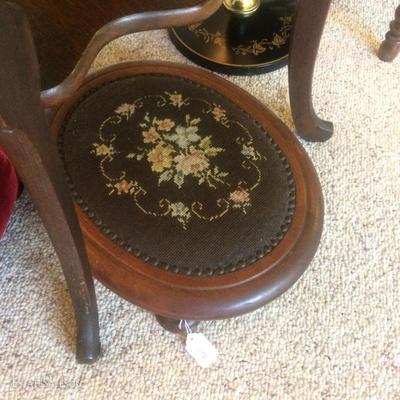Short antique foot stool with needlepoint