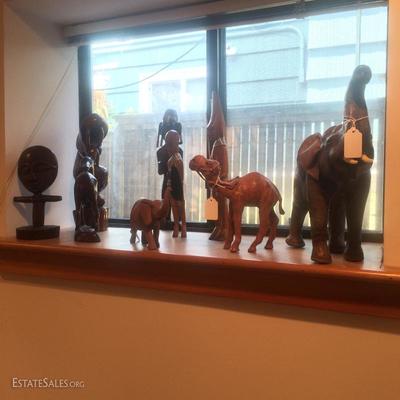 Leather, wooden, and ceramic figures