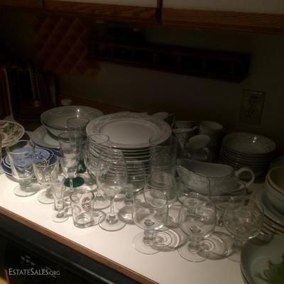 Glass stemware and a set of porcelain dishes