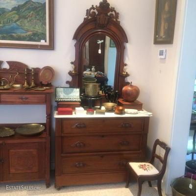 Antique mahogany vanity dresser with large mirror and white marble top