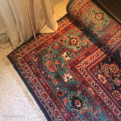  Large sized hand knotted Persian rug purchased in the 1930s. The size is approximately 11' x 14'. Great colors 