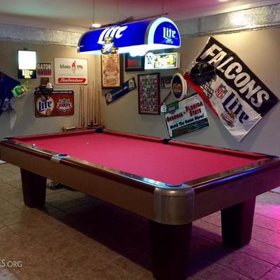 Hard to find 9' slate pool table, man cave items, vintage neons & signs.