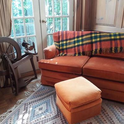 Spinning wheel ( in fantastic shape), ottoman, rug, loveseat (with matching loveseat not pictured), wool blanket and other linens.
