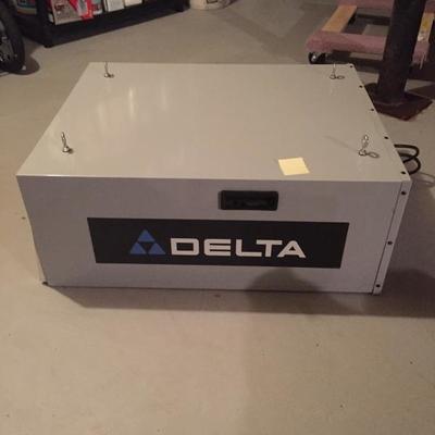 Delta air filtration system with remote and extra filters for woodworking area