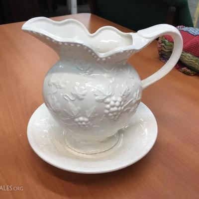 White pitcher with plate