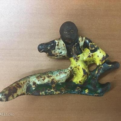 Cast iron boy with alligator