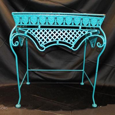 Blue metal and wicker table