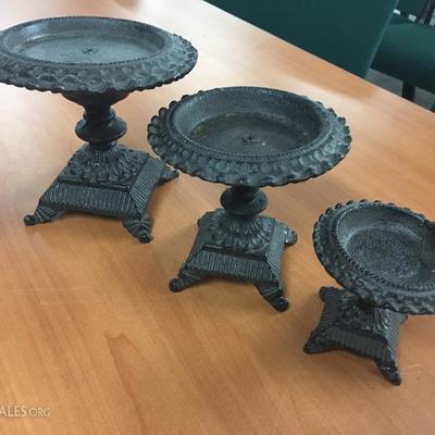 Cast iron candle holders