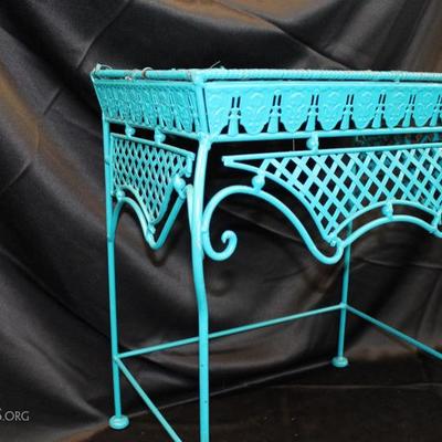 Blue metal and wicker table