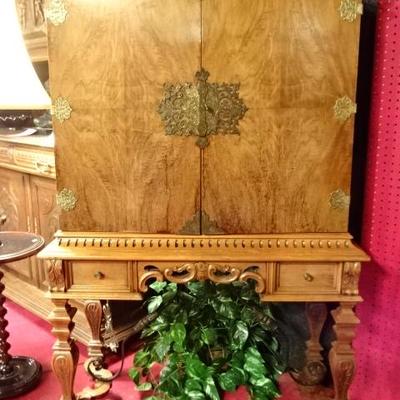 ANTIQUE SECRETARY WITH ELABORATE BRASS MOUNTS AND HINGES