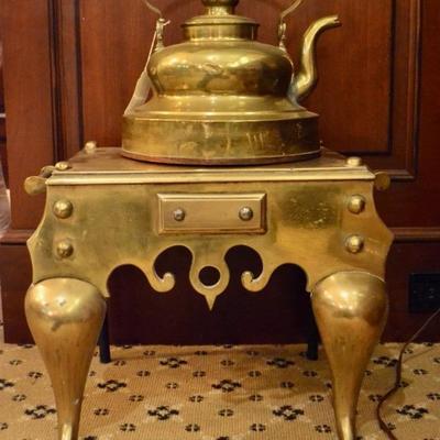 Brass kettle on stand