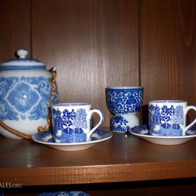 Blue and white cups and saucers