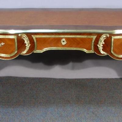 #140 – Fine French Carved Wood and Ormolu Desk with Leather Top, 32” h., 69” w., 35” d.