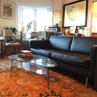 Kidney Shaped Coffee Table, Modular Sofa in Black Leather, Rug is NOT for Sale
