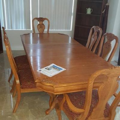 6 chair solid wood dining table and matching hutch 