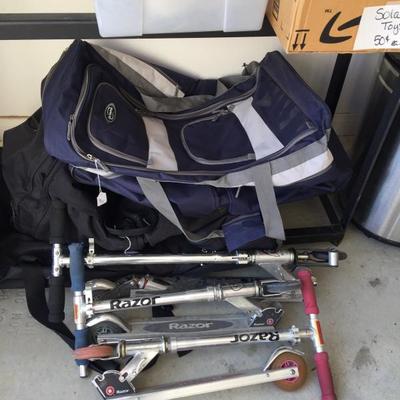 Razor scooters and tons of travel bags they purchased for their travels - it's looking like a store 