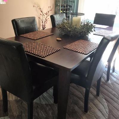 Gorgeous modern dining set w/6 leather chairs from Pier One
