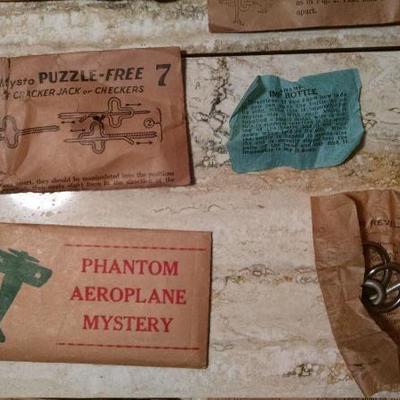 old puzzles in original paper bags
