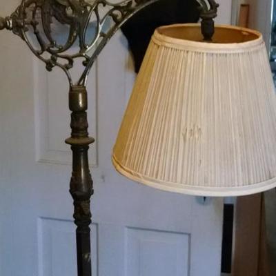 brass and marble floor lamp with dragon design
