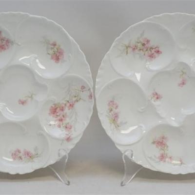 A matched pair of Haviland Limoges Porcelain Oyster Plates. Produced for for Newman & Parrot, Buffalo, NY. Each 8.25
